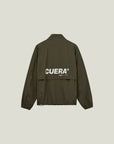 Model wearing Cuera Active Tracksuit Army 2.0 Bundle, front studio view