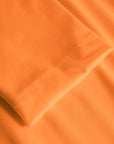 Cuera Oncourt LS Layer T-Shirt in Orange, hem detail