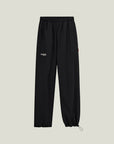 Cuera Active Cuera Track Pants in Black, flat lay front view