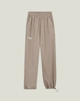 Cuera Active Cuera Track Pants in Taupe, flat lay front view