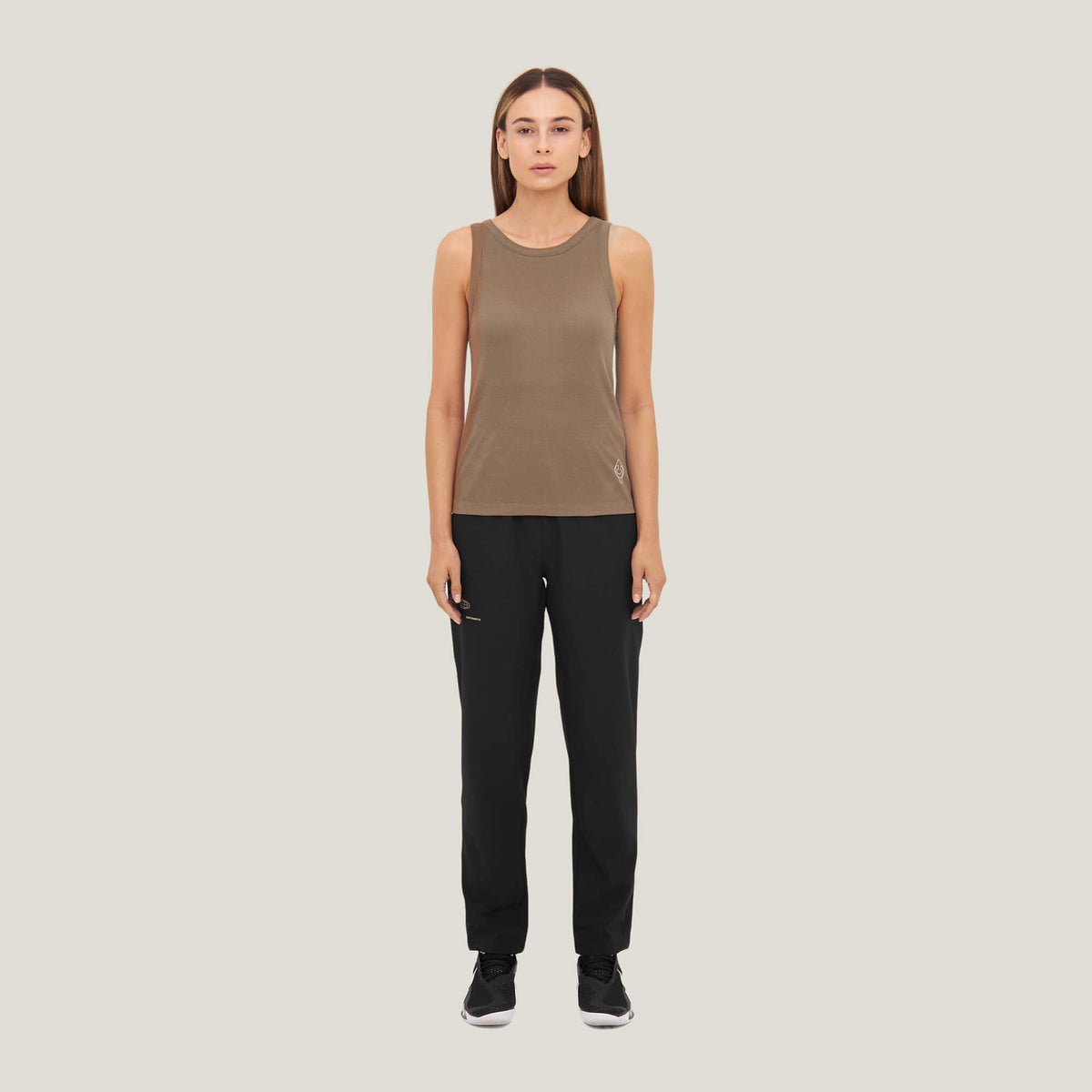 Model wearing Cuera Active Rib Tank Top Bundle W&amp;B, front studio view