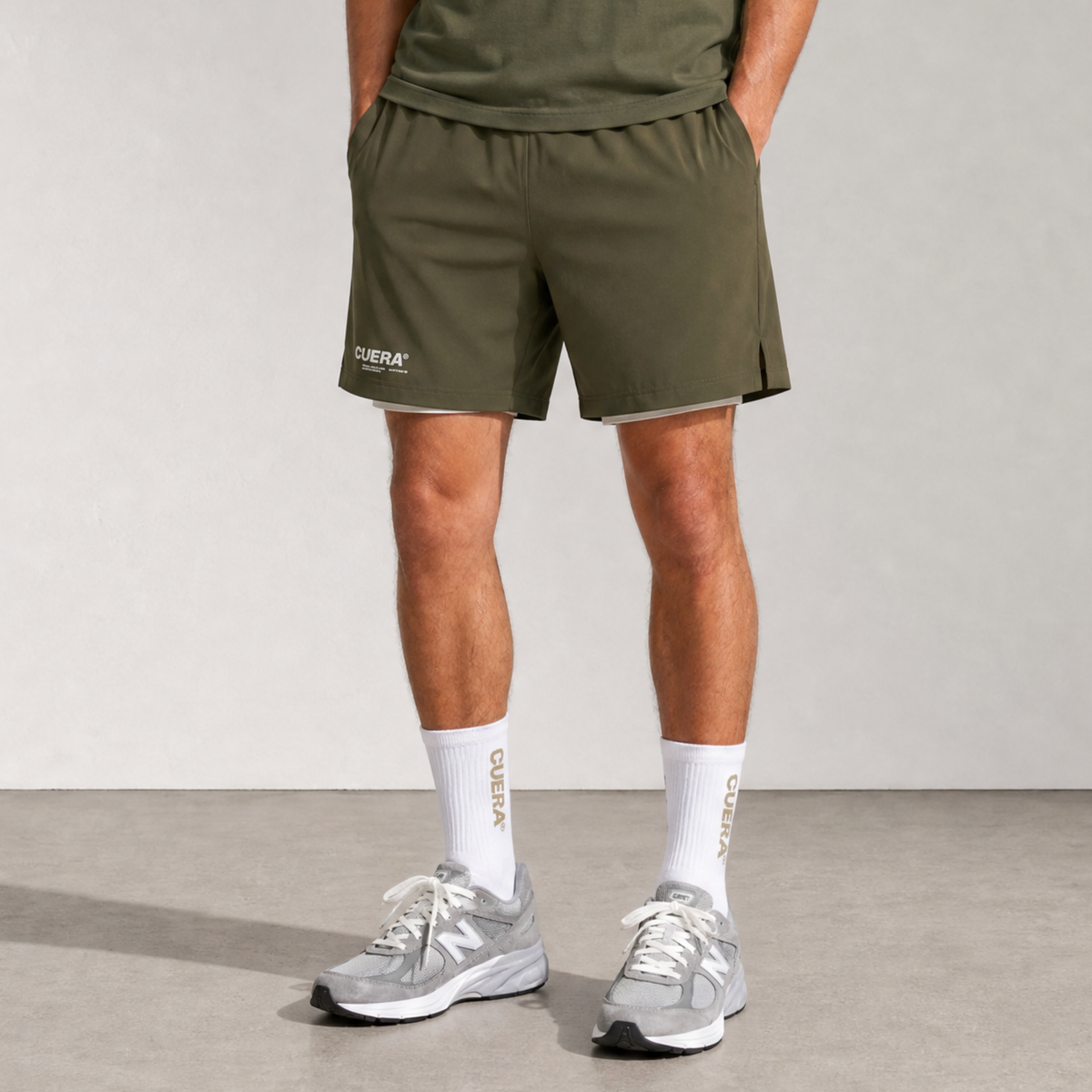 Model wearing Cuera Oncourt 2in1 Shorts Army &amp; 2-pack socks Walnut, front studio view