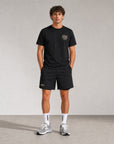 Model wearing Cuera Oncourt 2in1 Shorts in Black, front studio view