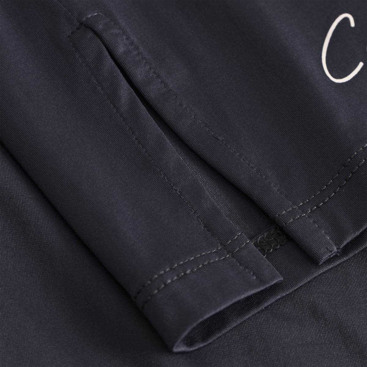 Cuera Oncourt Slit Top SS in Black, seam and stitching detail